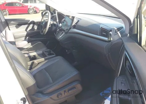 2021 Honda Odyssey Touring z USA, uszkodzony, nr VIN 5FNRL6H82MB000486